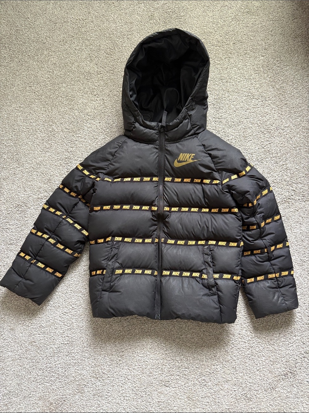 Nike Black Hooded Kids Puffer Jacket with Gold Logo and Trim